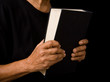old woman holding bible