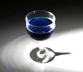 glowing glass of blue