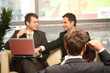 © endostock - brainstorm. three business people in the office
