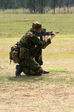 Soldier Firing A Rifle