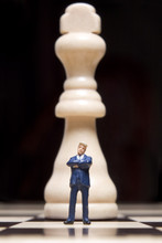 Business Figurine And Chess