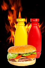 Wall Mural - burger over a flames background