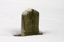 Tombstone In The Snow
