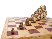 Team Ordered Row Nested Dolls On Chessboard Russia