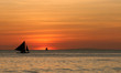 Leinwandbild Motiv sailing off into the sunset
