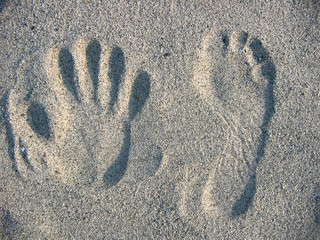 photo  footprints in beach sand