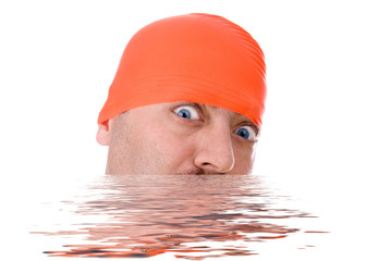 man with an orange swim cap in water