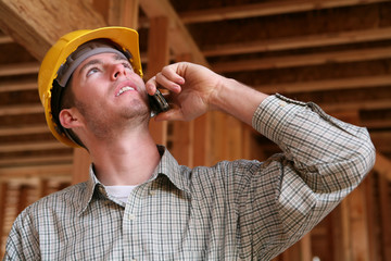 construction worker on phone