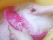 womans hand washing up