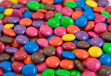 Background Pile Of Smarties Chocolates