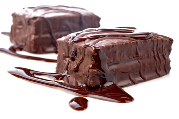 two chocolate cakes with syrup