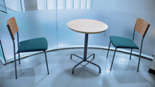 Two Chairs And Round Table