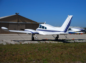 Poster - small private airplane rear view