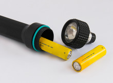Black Flashlight And Batteries