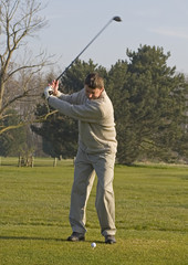 Wall Mural - joueur de golf au départ