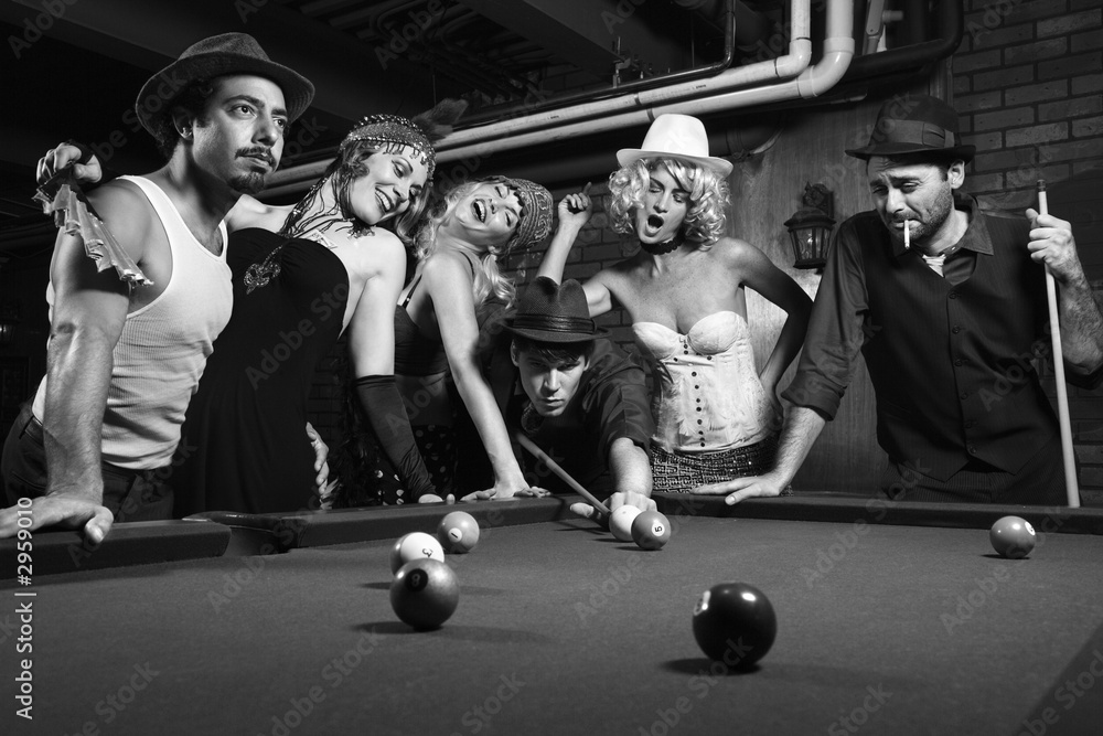 retro group trying to distract man as he takes pool shot. - obrazy, fototapety, plakaty 