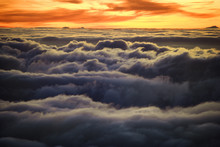 Sunrise Over Clouds In Haleakala, Maui, Hawaii.