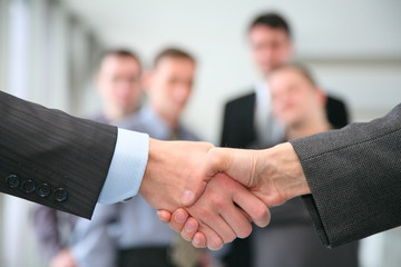 shaking hands and business team