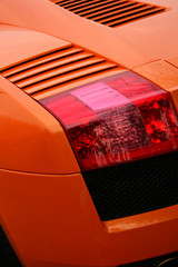 Wall Mural - orange supercar brakelight