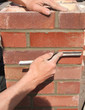bricklayer pointing brickwork