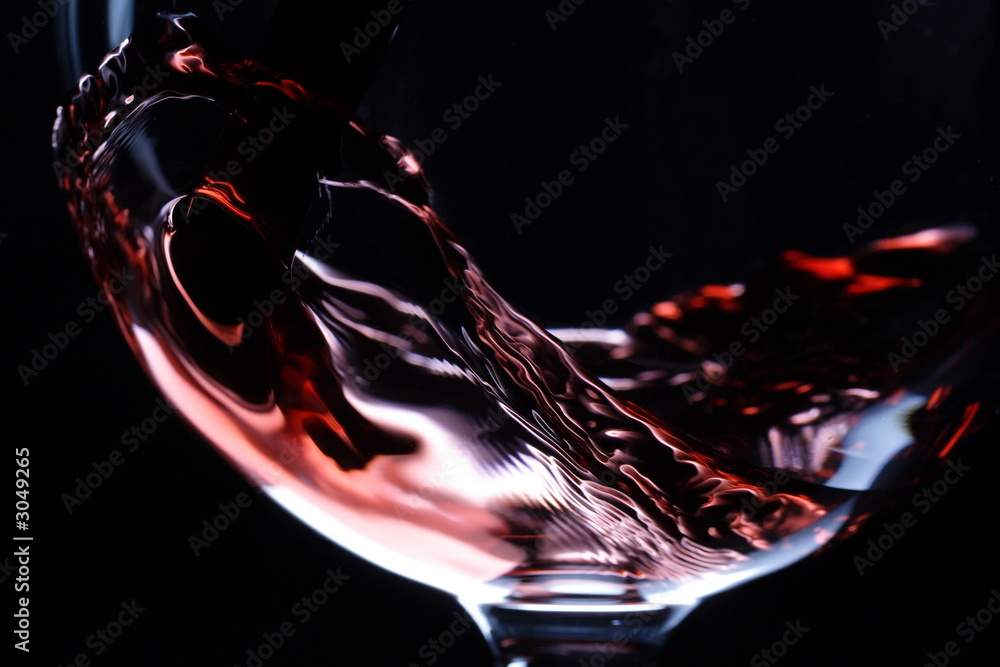 closeup of red wine pouring - obrazy, fototapety, plakaty 