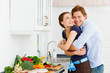 young couple in their kitchen