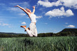 © Julia Britvich - happy woman joyful fly