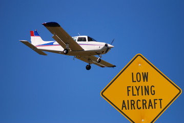 Wall Mural - low flying airplane