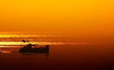 Canvas Print - small boat late at night