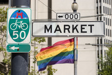 Sign For Market Street And Gay Pride Flag