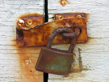 Door Locked With An Old Rusty Lock