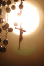 Rosary Backlighting In Mystical Atmosphere