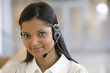 © carlosseller - Smiling call center woman