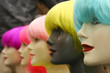  faces of  mannequins with different hair and skin-colors