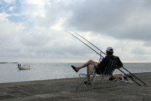 Fisherman Waiting The Fish