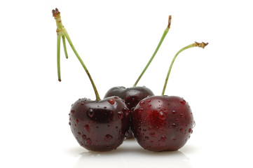 Wall Mural - Three cherries with water drops