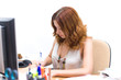 © Igor Stepovik - Attractive girl writing document in office
