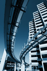 Fototapete -  Urban architecture. Buildings and monorail 