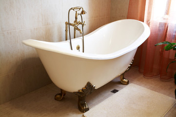 Beautiful, white bath in a modern bathroom