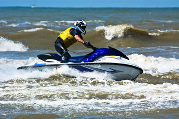 extreme  jet-ski watersports with big waves