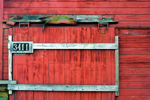 Weathered Sliding Barn Door With Addresss