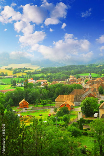 Rural landscape with hills and a small village in eastern France