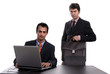 © Rui Vale de Sousa - two young business man working with laptop