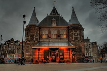 Old Dutch Building In Red Lights In Amsterdam
