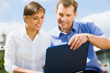 Canvas Print - Business man trains his colleague