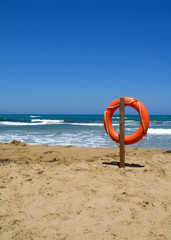 Poster - Life bouy in the empty beach of Crete