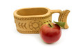 Traditional mug and apple isolated over white