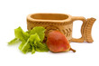 Traditional mug, pear and lettuce isolated over white
