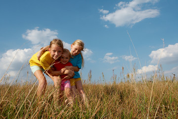 Wall Mural - Children on a meadow