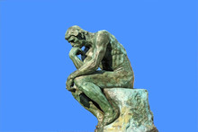 Thinker Isolated Over Blue